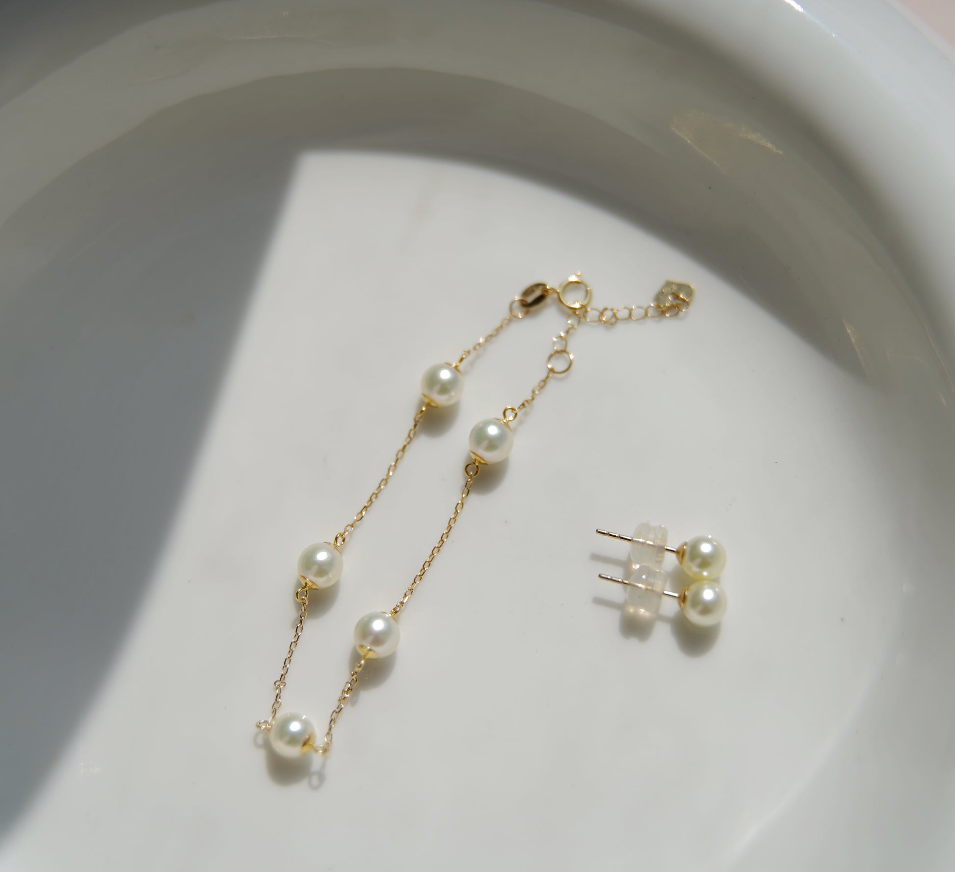 Akoya pearl earrings and bracelet collection