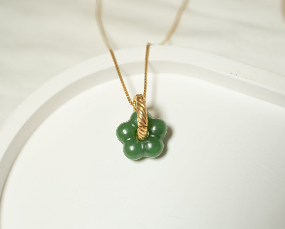 Findingyoyo Jardin necklace featuring a hand-carved green Hetian jade flower pendant on an 18K gold vermeil chain