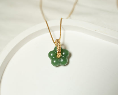 Findingyoyo Jardin necklace featuring a hand-carved green Hetian jade flower pendant on an 18K gold vermeil chain