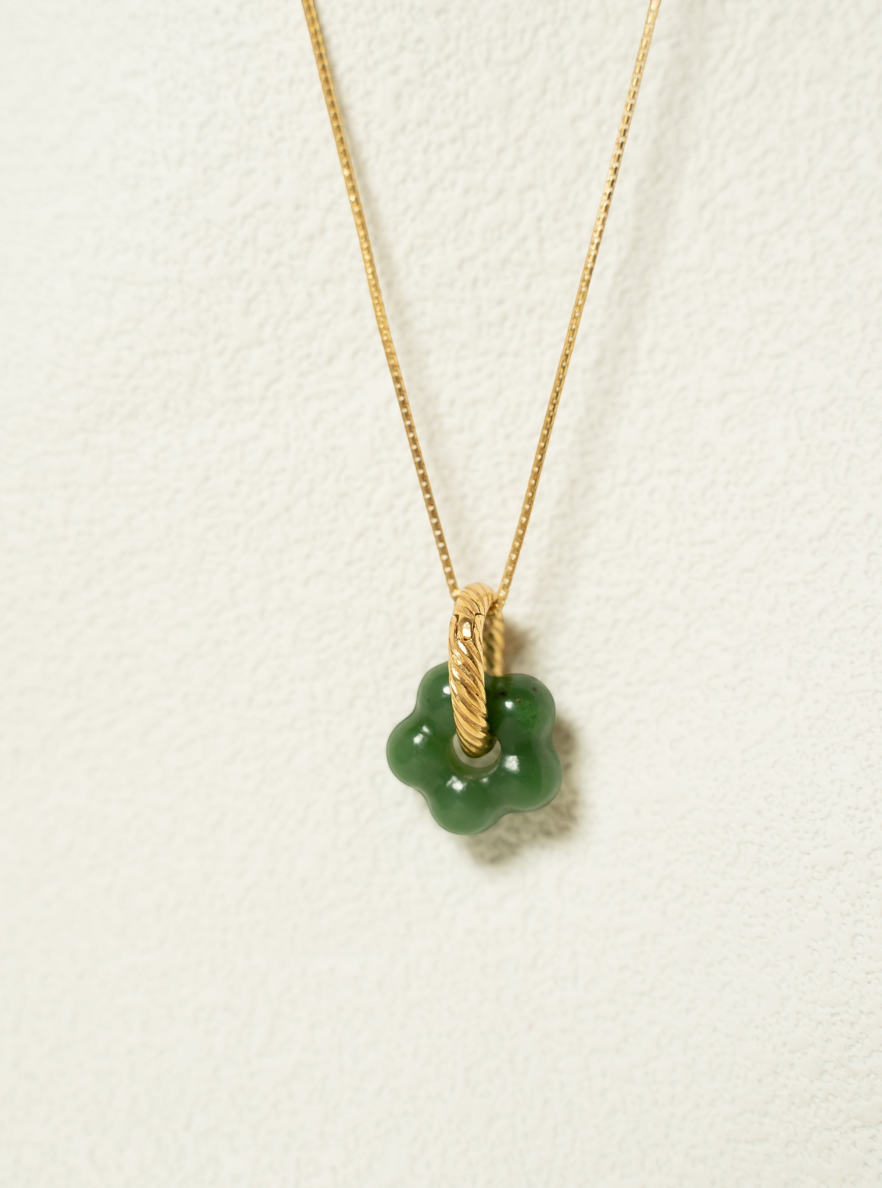 Findingyoyo Jardin necklace featuring a hand-carved green Hetian jade flower pendant on an 18K gold vermeil chain
