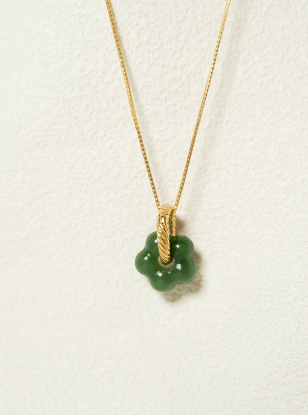 Findingyoyo Jardin necklace featuring a hand-carved green Hetian jade flower pendant on an 18K gold vermeil chain