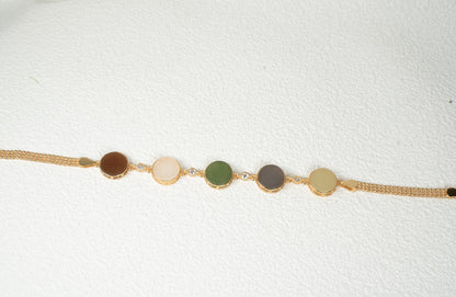 Findingyoyo Full Fortune bracelet featuring five round multi-colored Hetian jade stones with gold vermeil accents.