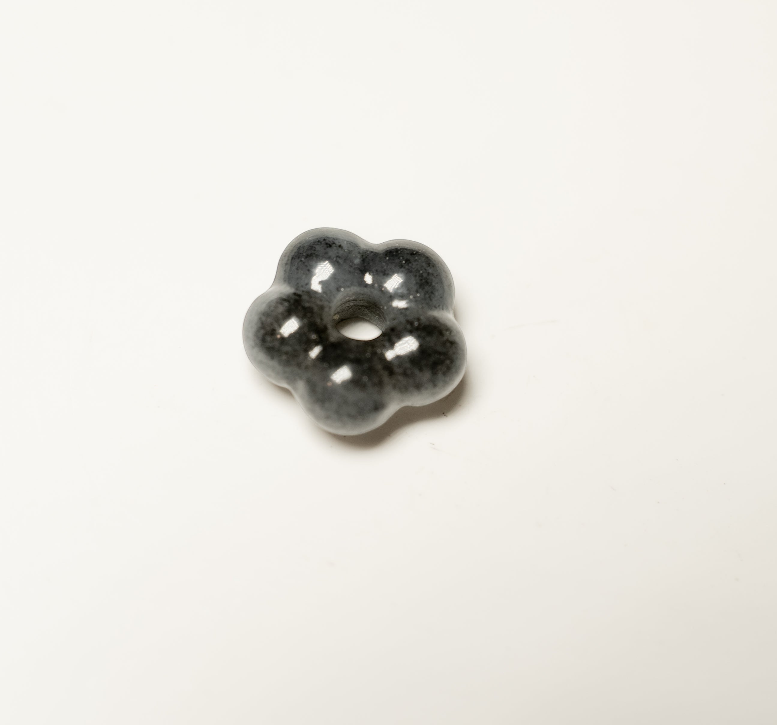 Findingyoyo Jardin Necklace featuring a hand-carved grey and black speckled natural Hetian jade flower pendant