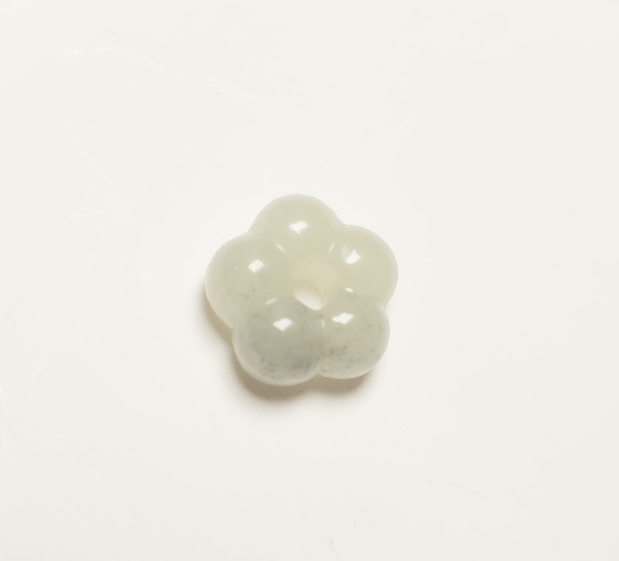 Findingyoyo Jardin Necklace featuring a unique hand-carved pale celadon Hetian jade flower pendant