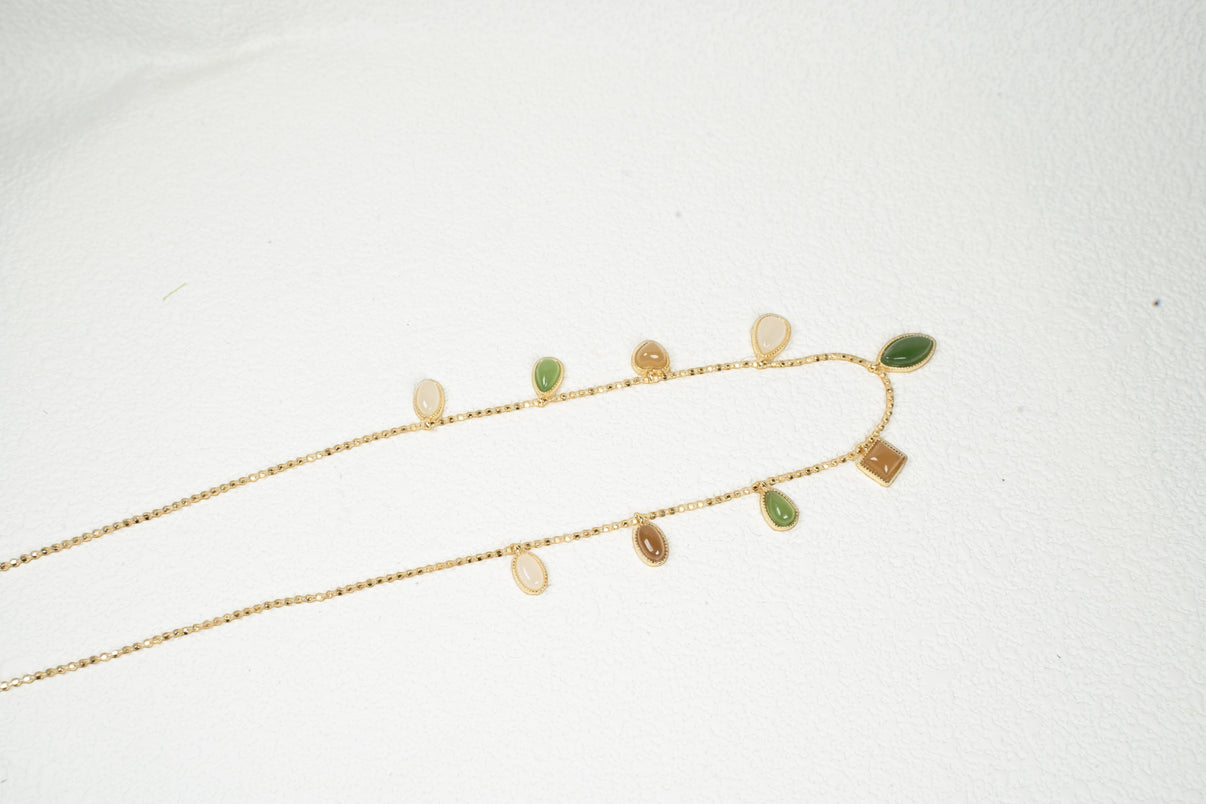 Findingyoyo Full Fortune bracelet featuring multi-colored Hetian jade charms and gold vermeil accents on a delicate chain