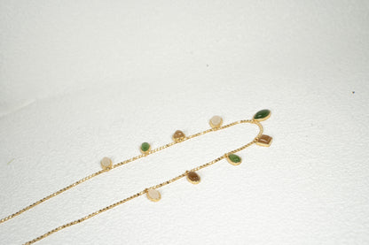 Findingyoyo Full Fortune necklace featuring multi-colored Hetian jade charms on a delicate gold vermeil chain.