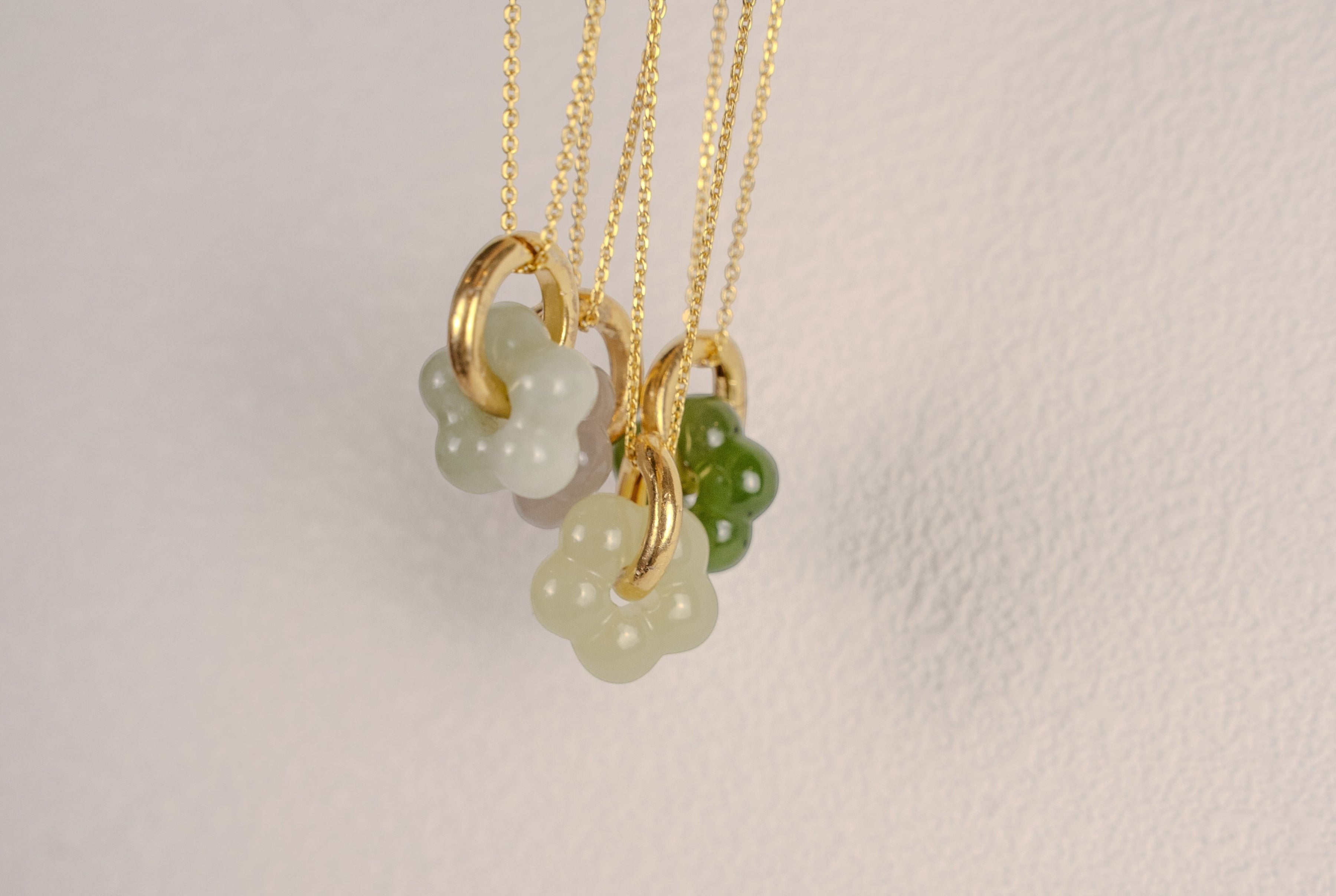 Findingyoyo Jardin Necklace featuring hand-carved natural Hetian jade flowers on 18K gold vermeil chains