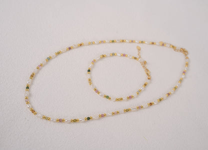 Findingyoyo Skittles set featuring a gold vermeil necklace and bracelet with natural tourmaline and keshi pearls.