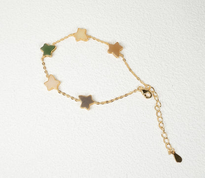 Findingyoyo Full Fortune bracelet featuring star-shaped multi-colored Hetian jade beads with gold vermeil accents.
