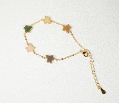 Findingyoyo Full Fortune bracelet featuring star-shaped multi-colored Hetian jade beads with gold vermeil accents.