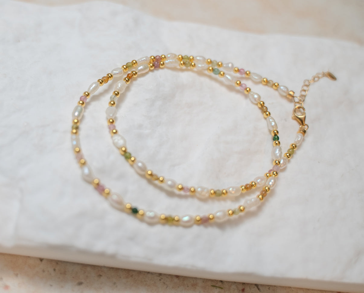 Findingyoyo Skittles necklace featuring natural tourmaline gemstones and freshwater keshi pearls on gold vermeil chain.
