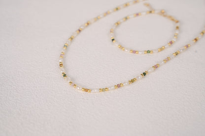 Findingyoyo Skittles set featuring a gold vermeil necklace and bracelet with natural tourmaline and keshi pearls.