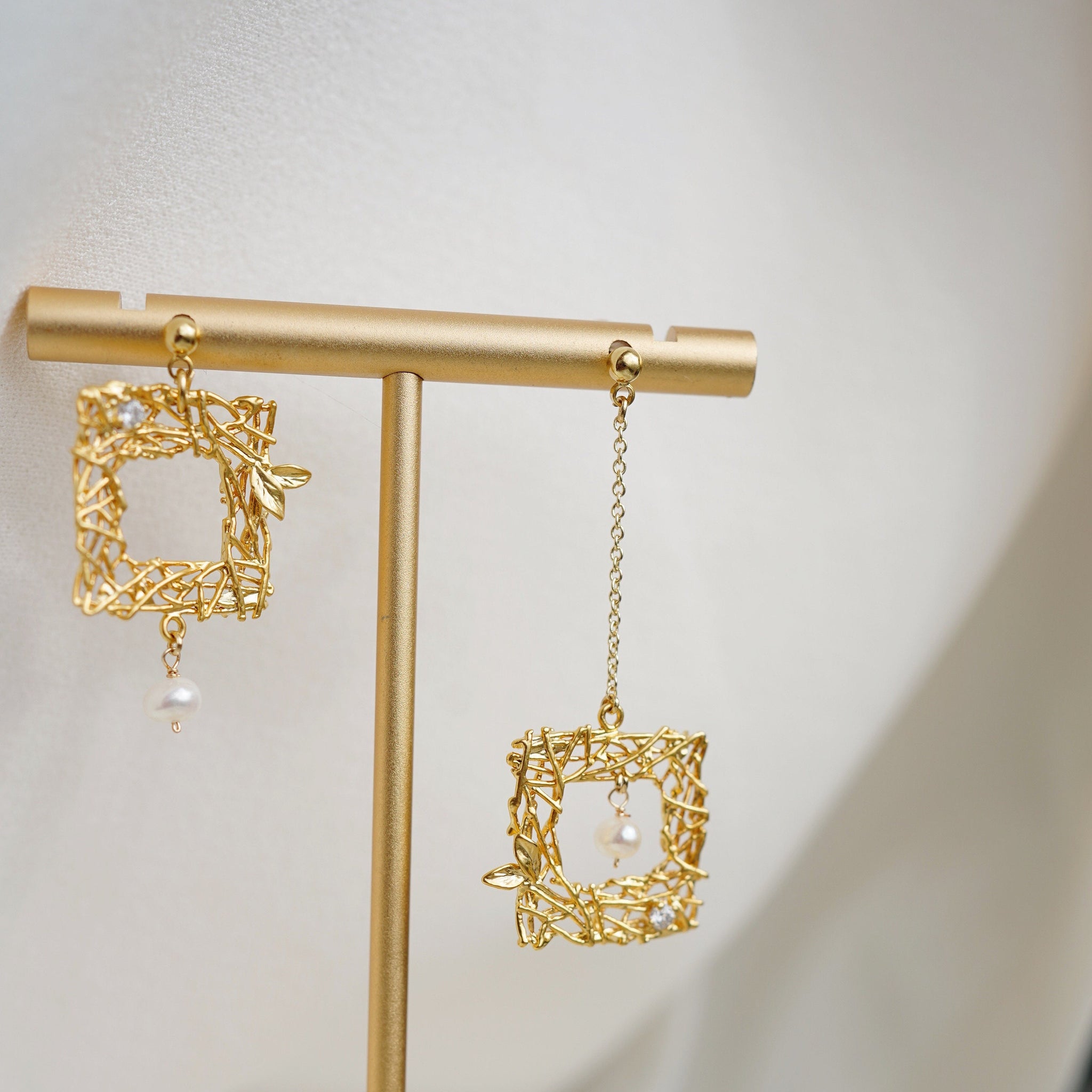 Gold square earrings