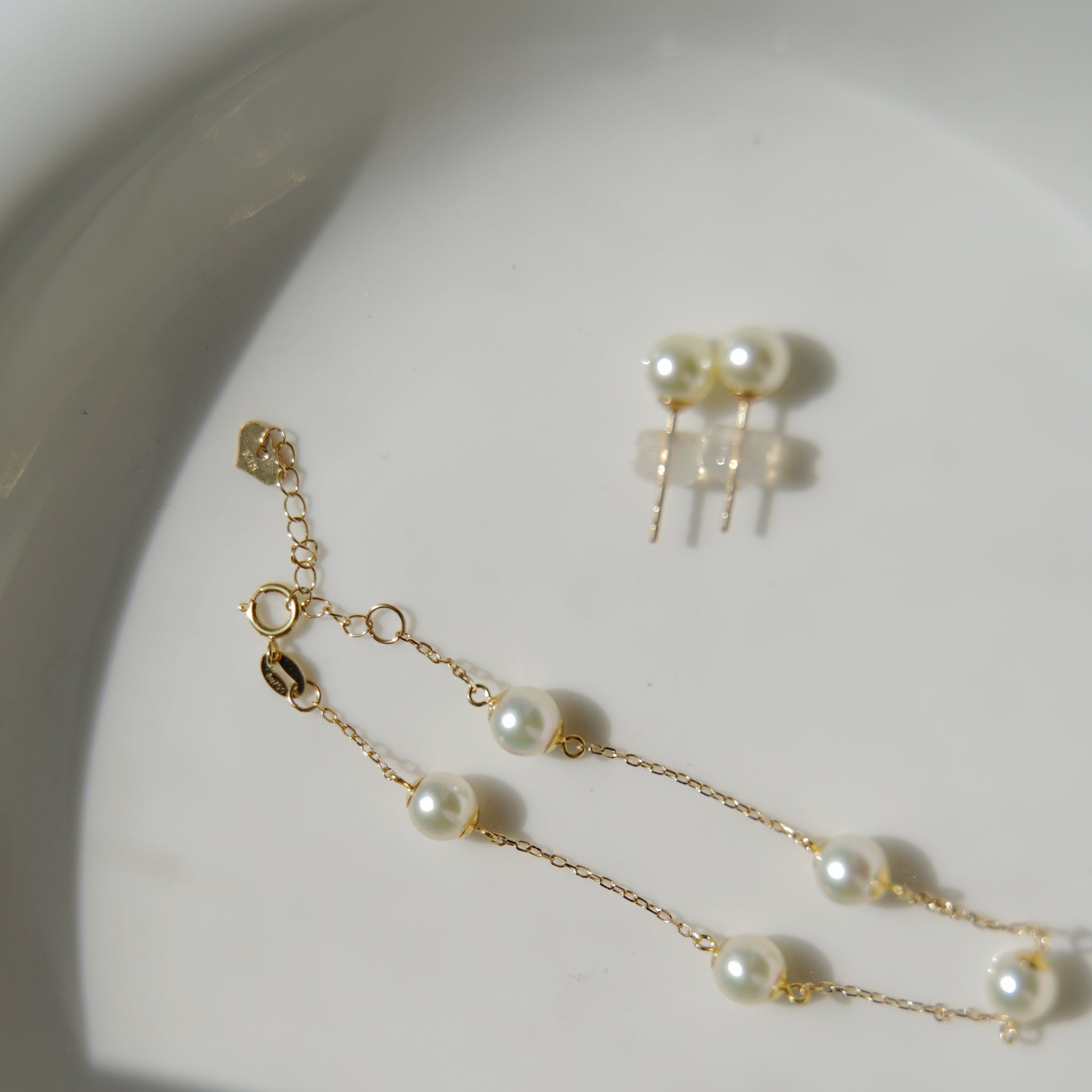 Akoya pearl earrings and bracelet collection