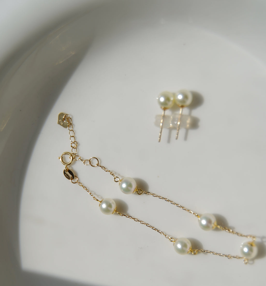 Akoya pearl earrings and bracelet collection